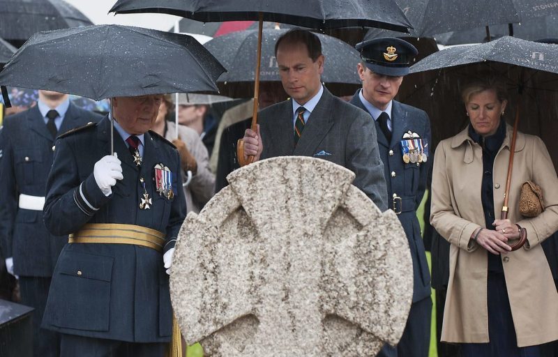 Prince Edward standing over the rededication of the Airman's Cross at Stonehenge in May 2014