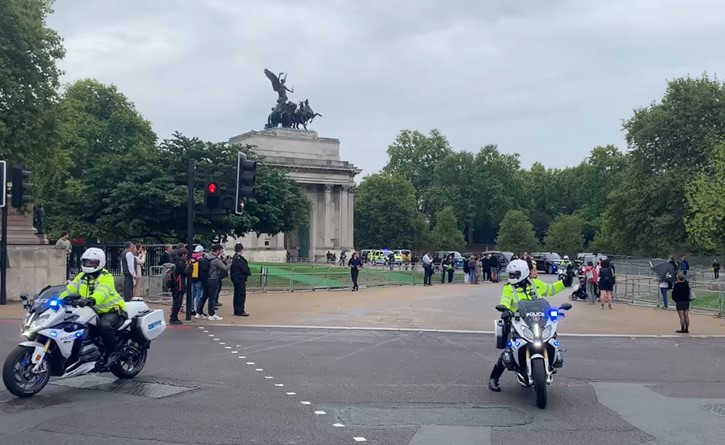 Police prepare for the arrival of the Queen's coffin