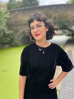 Ana da Cunha, stood in front of a canal