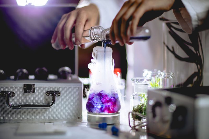 Person pouring cocktails