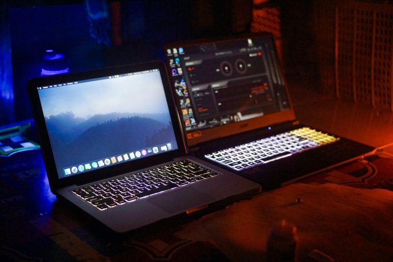 two laptops side by side