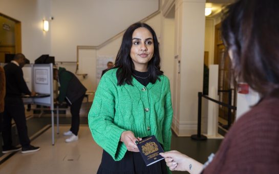 Voter presenting photo ID to vote. copyright: https://www.electoralcommission.org.uk