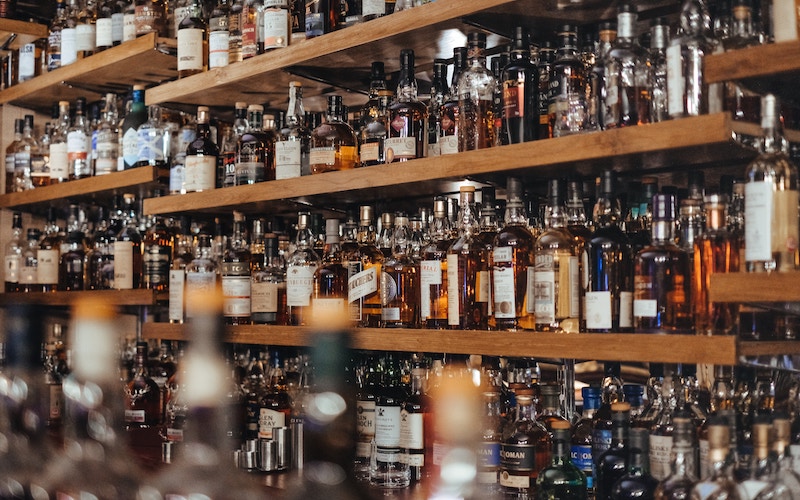 Whisky bottles behind a bar