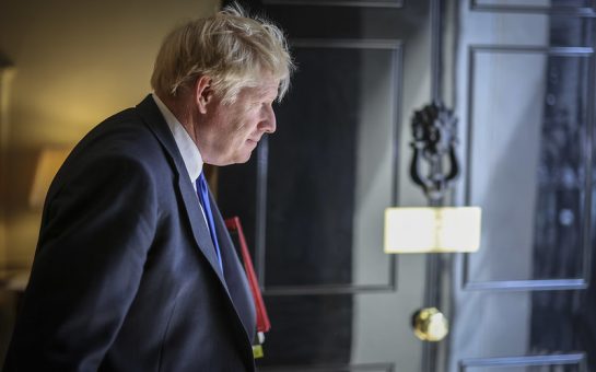 Boris Johnson standing pensively