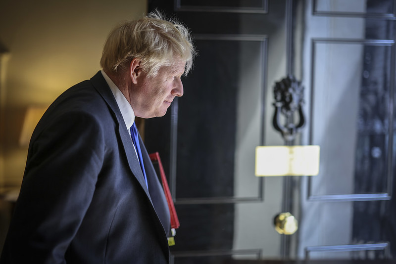 Boris Johnson standing pensively