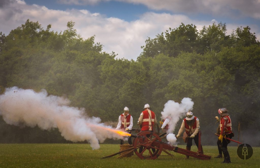 Re-enactors at last year's festival fire a cannon.