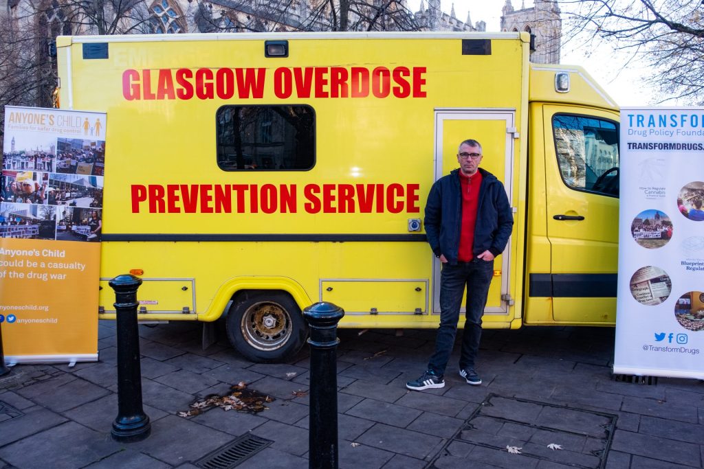 Glasgow Overdose Prevention service founded by Peter Krykant who is standing in front of the ambulance