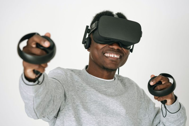 Person wearing a VR headset and gloves