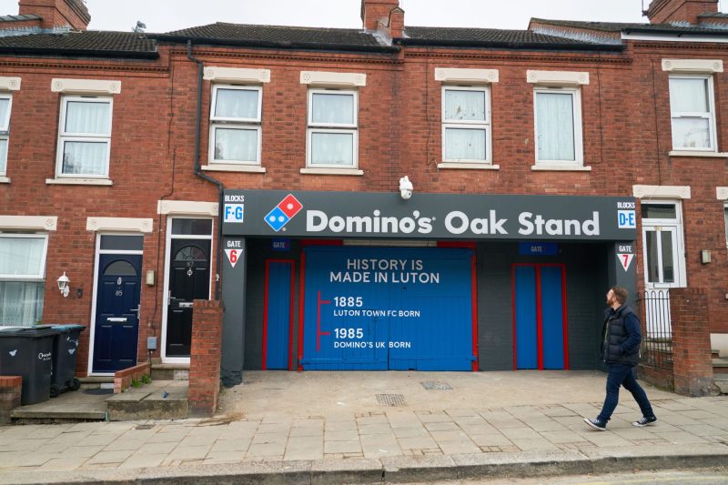 The entrance to the Oak Stand with Domino's branding