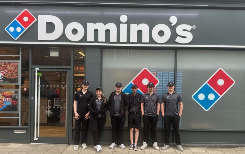 The family outside Domino's
