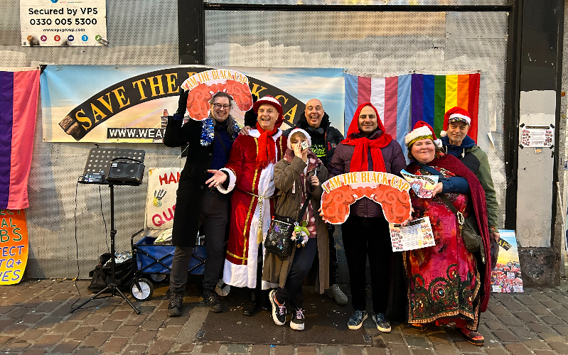 Activists outside the Black Cap for their Christmas vigil