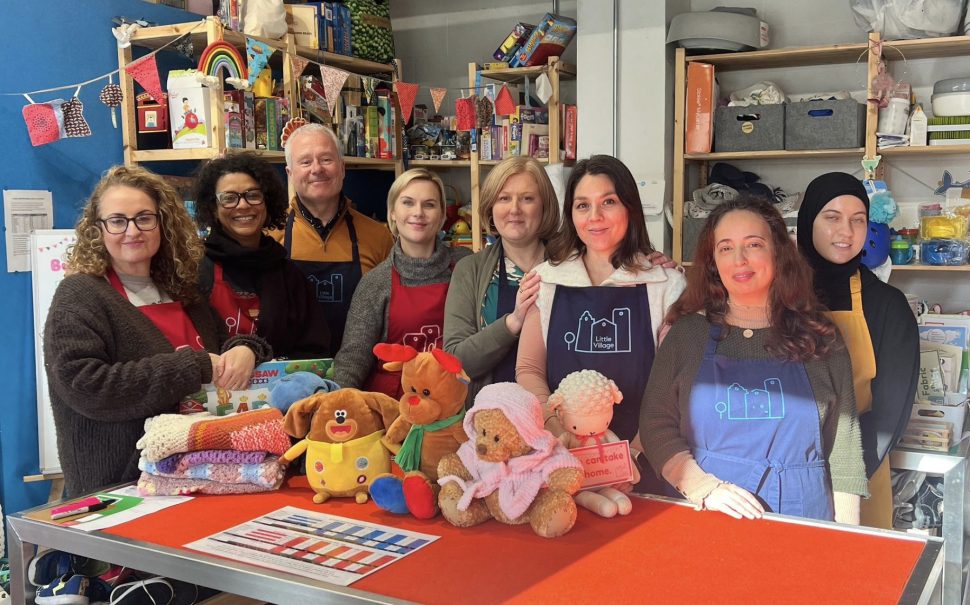 Group photo of staff and volunteers at Little Village's Brent hub