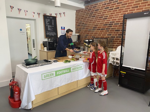 Ex-Arsenal footballer Mathieu Flamini giving a plant-based meal to two young fans