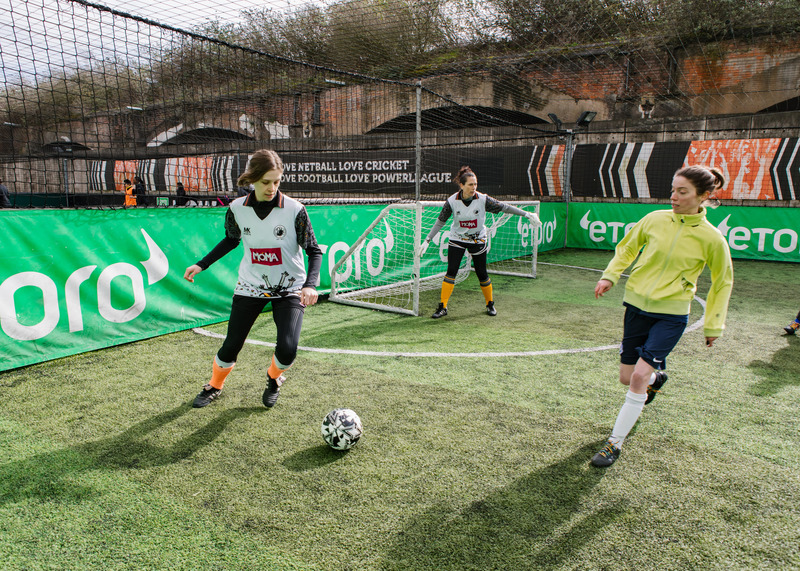 young girls playing football