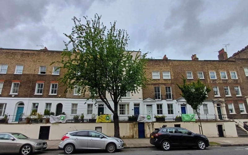 Houses on Liverpool Road displaying posters in support of the campaign.