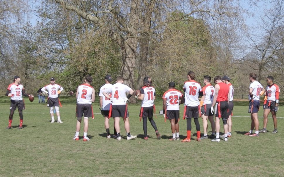 London Rebels huddle and listen to an address by captain Brian Taber