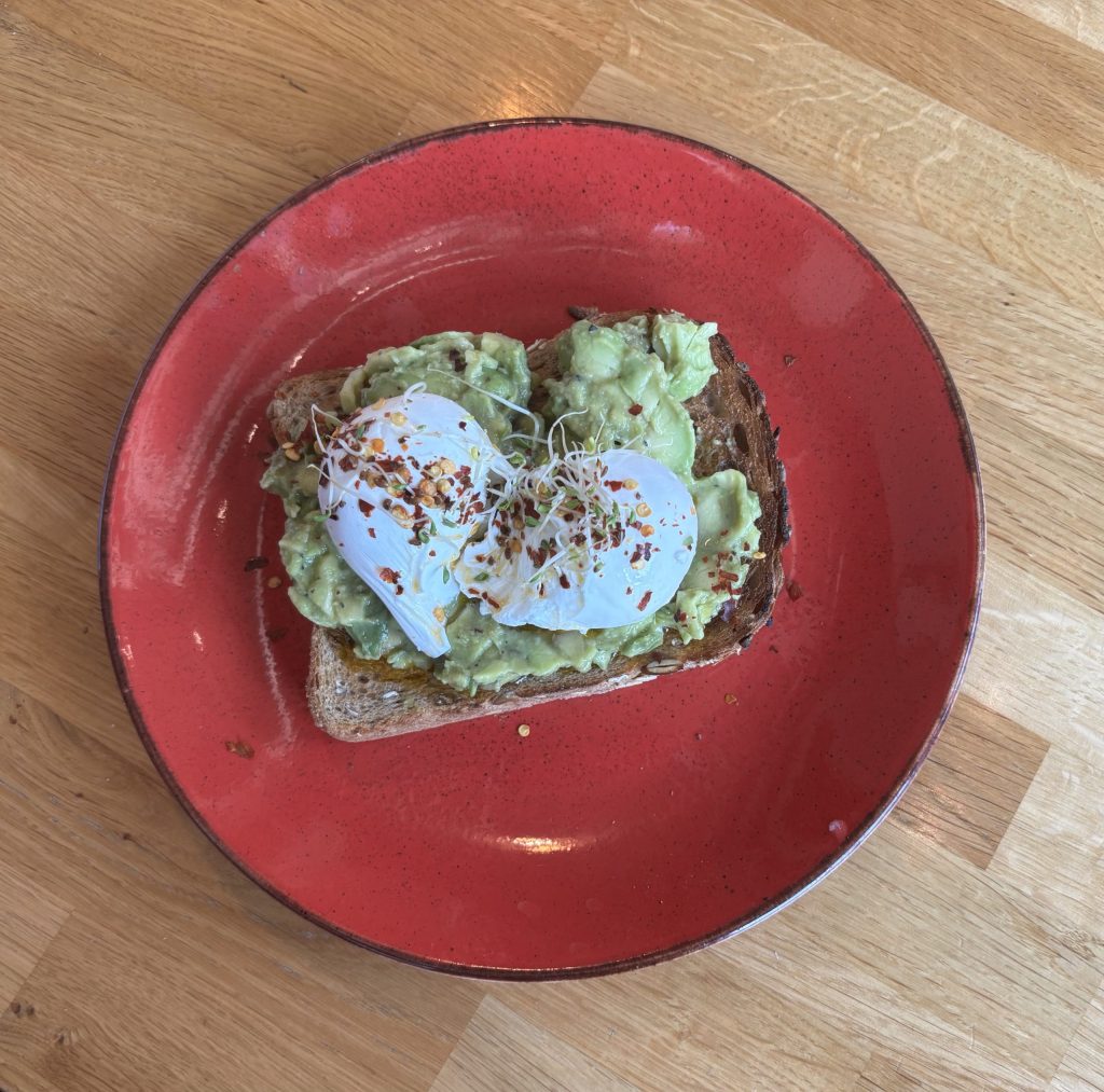 Poached eggs with avocado on toast at Bread Ahead in Wembley.