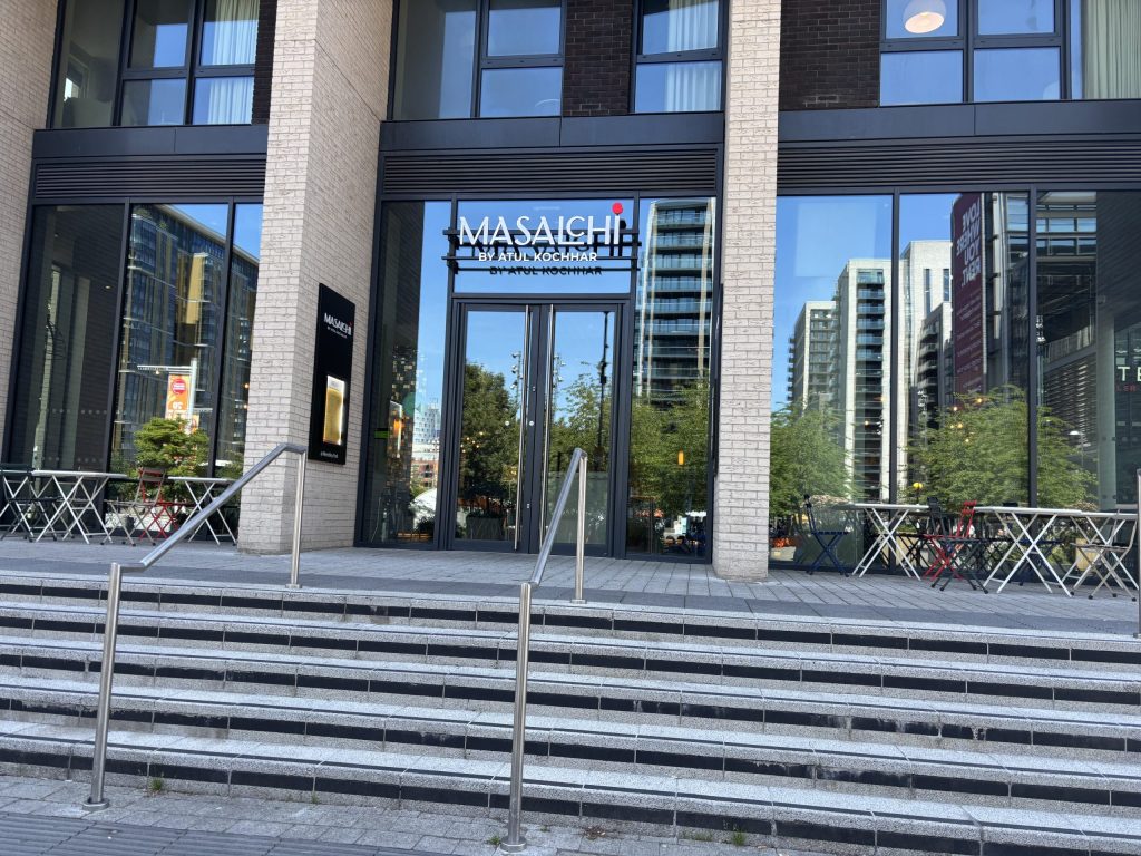 The exterior of Masalchi by Atul Kochhar, an Indian restaurant next to Wembley Stadium.