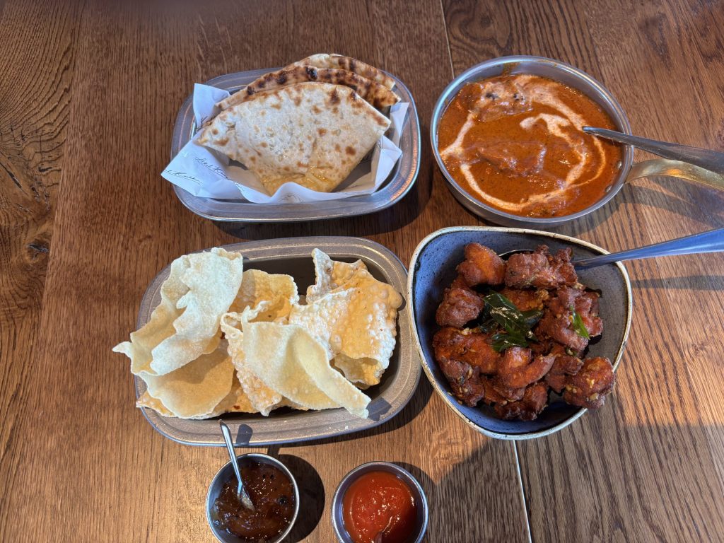Food from Masalchi by Atul Kochhar, an Indian restaurant next to Wembley Stadium.