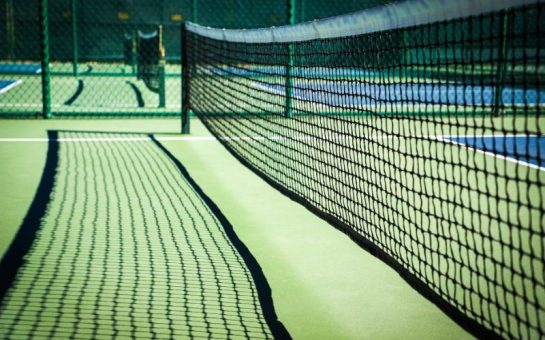 A photo of a tennis court.