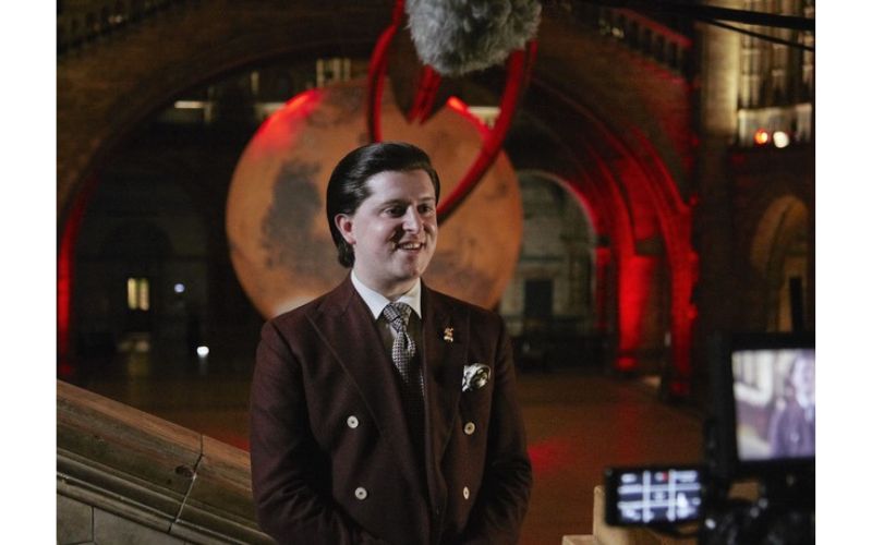 Birbeck University Professor Keyron Hickman-Lewis standing in front of the Mars exhibit at the Natural History Museum, London.
