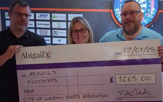 COLDA committee members presenting Abigail's Footsteps with a check for over £1000 earlier this year.