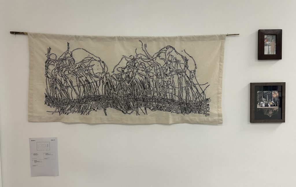 A stitch on canvas by artist Cathy Peake, entitled 'Waterside', depicting an abstract representation of the Ladies' Pond in Hampstead Heath.