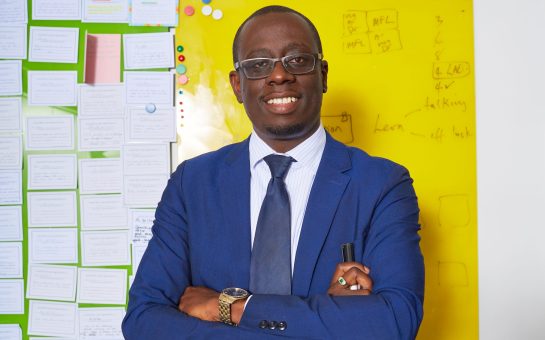 Man posing with his arms folded