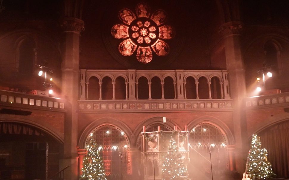 Wassail is performed on the christmas tree adorned stage at the union chapel