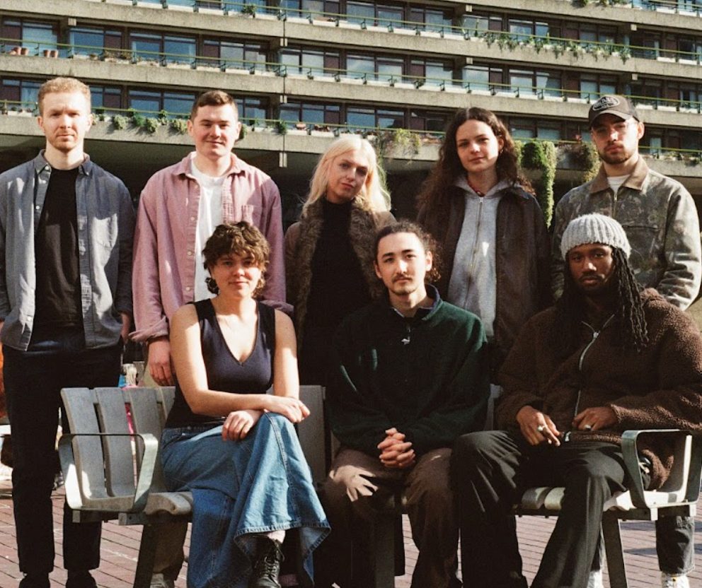 eight members of the neo-soul jazz band Orchard. Image supplied by Orchard