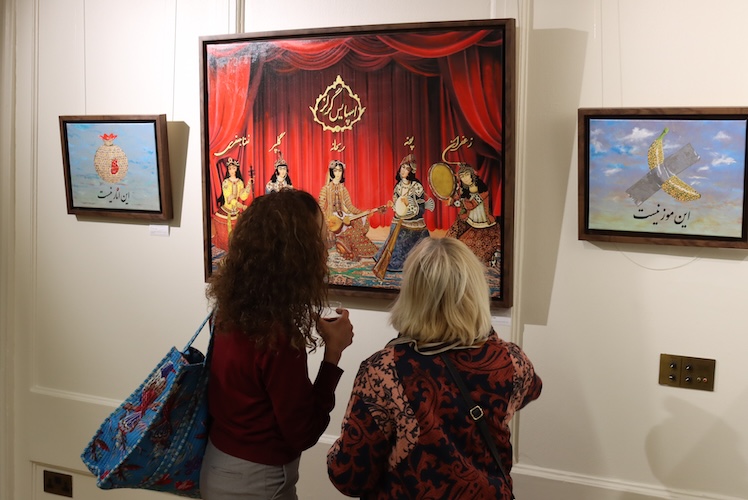 Two exhibition-goes admire Persian art on display at Lauderdale House