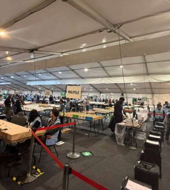 Election count in a town hall for the Ealing local elections 2026.
