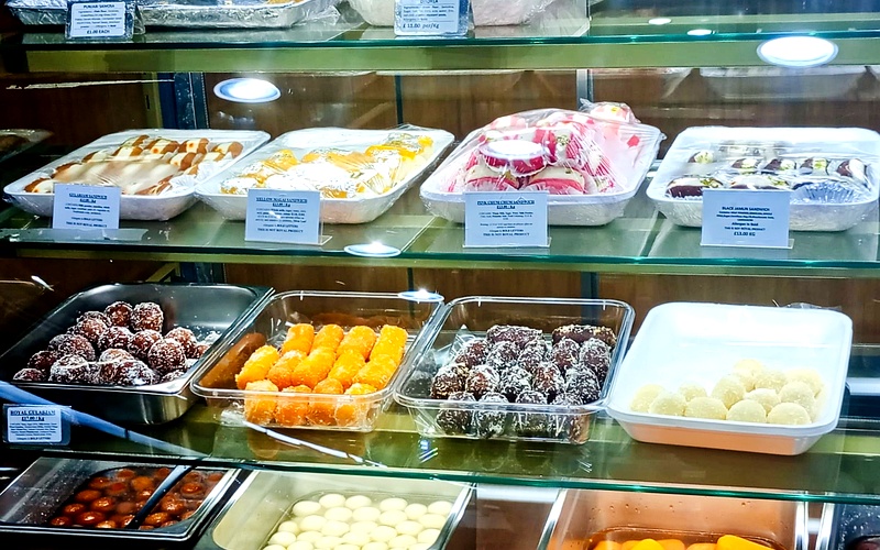 Indian sweet shop display counter Southall Broadway Ealing