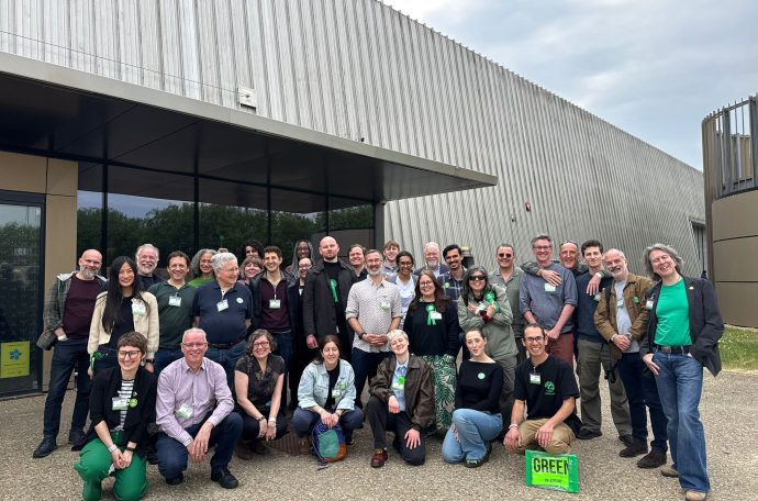 Group of Green Party supporters pose for picture surrounding first ever elected Barnet Green councillor