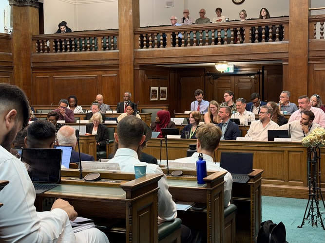 Camden Council meeting with councillors and attendees seated in the council chamber, London, 14 September 2026.