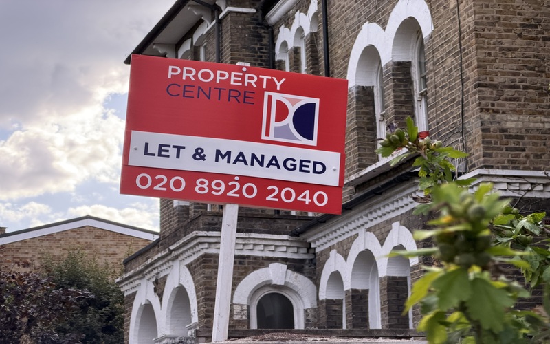 "Let & Managed" sign outside a residential property in Holborn and St Pancras, Camden, London