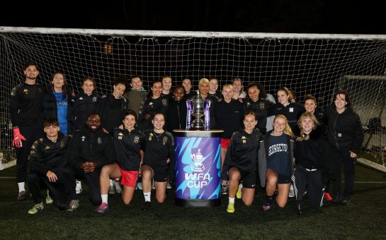 Hammersmith FC's women's first team pose with FA cup during their Wednesday night training session ahead of their first round proper fixture against AFC Wimbledon.