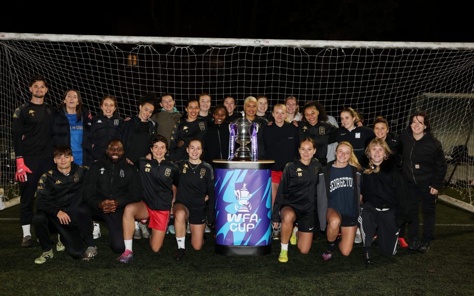 Hammersmith FC's women's first team pose with FA cup during their Wednesday night training session ahead of their first round proper fixture against AFC Wimbledon.