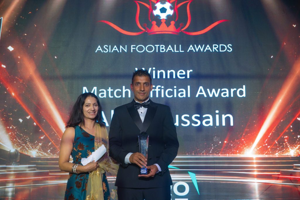Abid Hussain accepting his match official award